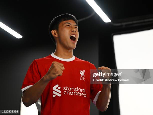 Wataru Endo new signing of Liverpool at AXA Training Centre on August 18, 2023 in Kirkby, England.