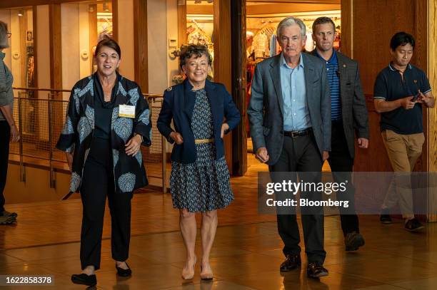 Jerome Powell, chairman of the US Federal Reserve, right, Michelle Smith, chief of staff of the US Federal Reserve, left, and Elissa Leonard arrive...