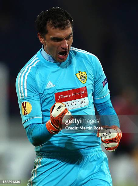 Vladimir Gabulov, goalkeeper of Makhachkala celebrates after the UEFA Europa League Round of 32 second leg match between Hannover 96 and Anji...