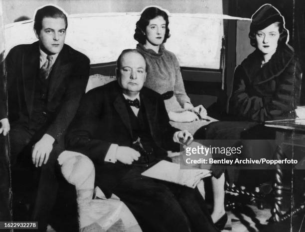 British statesman Winston Churchill with his children, Randolph, Sarah and Diana, Liverpool, 5th February 1935.