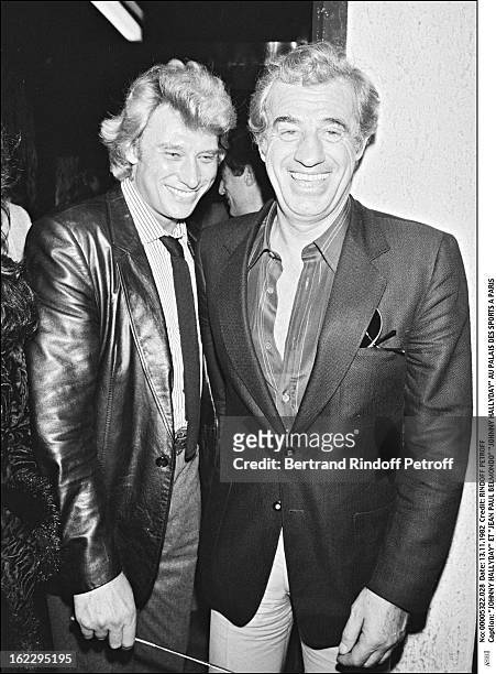 Johnny Hallyday and Jean-Paul Belmondo in Johnny's dressing room the night of his concert in Palais Des Sports, Paris .