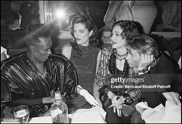 Grace Jones, Helmut Berger and his girlfriend at the party for the "Palace" fifth anniversary.