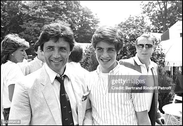 Sacha Distel and his son Julien at 1983 Roland Garros tennis tournament.