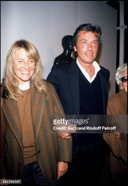 Alain Delon with his girlfriend Catherine Pironi at sculptor Paul ...