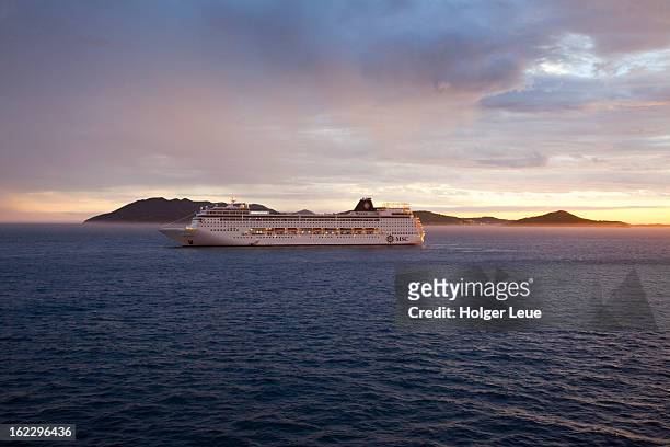 cruise ship msc armonia (msc cruises) at sunset - mid distance stock pictures, royalty-free photos & images
