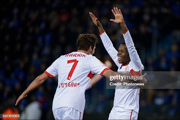 Martin Harnik and Ibrahima Traore of Stuttgart celebrate during the UEFA Europa League round of 32 second leg match between Racing Genk and VfB...