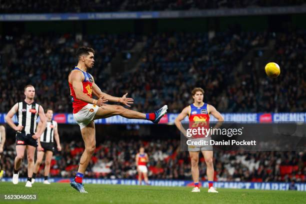 Charlie Cameron of the Lions kicks a goal during the round 23 AFL match between Collingwood Magpies and Brisbane Lions at Marvel Stadium, on August...