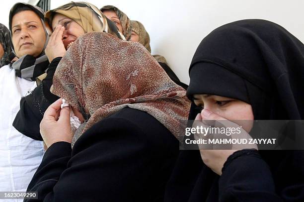 Relative of Lebanese army soldier Mustapha Ali Dahi mourn during his funeral procession in the village of Saksakiyeh in south Lebanon, 12 June 2007....