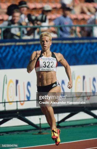German athlete Grit Breuer during the women's 400 metres event of the 2001 IAAF World Championships, held at Commonwealth Stadium in Edmonton,...