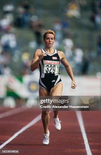 German athlete Grit Breuer during the women's 200 metres event of the 1997 German Athletics Championships, held at the Waldstadion in Frankfurt,...