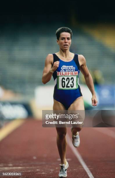 German athlete Grit Breuer competes in the women's 400 metres event of the 1996 German Athletics Championships, held at the Mungersdorfer Stadium in...