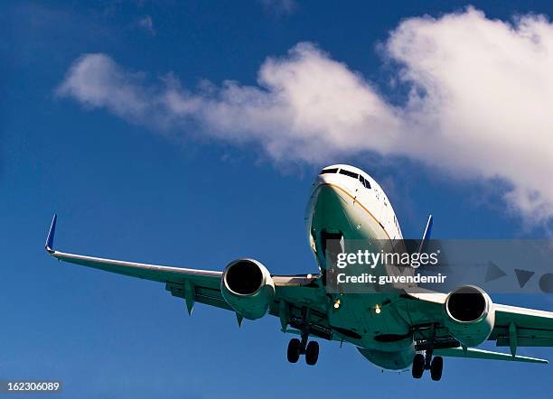 airplane in the sky - facing things head on stock pictures, royalty-free photos & images