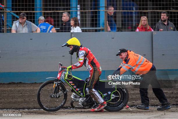 Tom Brennan gets a push back to the pits after his fall during the Sports Insure Premiership match between King's Lynn Stars and Belle Vue Aces at...