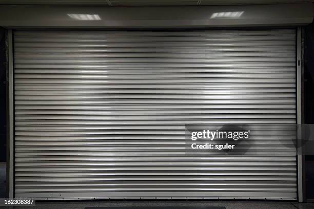 closed steel door - facade stock illustrations