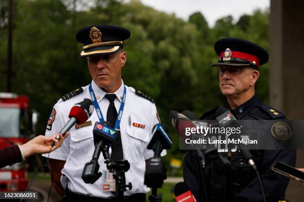 August 25 - Toronto Fire division commander Steve Darling provides an update to the media at Earl Bales Park in Toronto. Emergency workers were on...