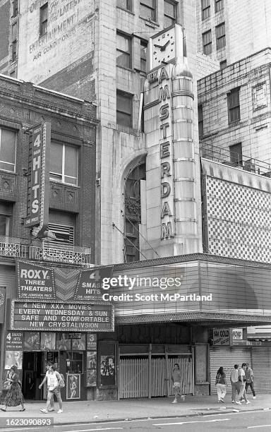 Exterior view of the Roxy Theater and the shuttered New Amsterdam Theater on West 42nd Street in Times Square, New York, New York, July 27, 1991.