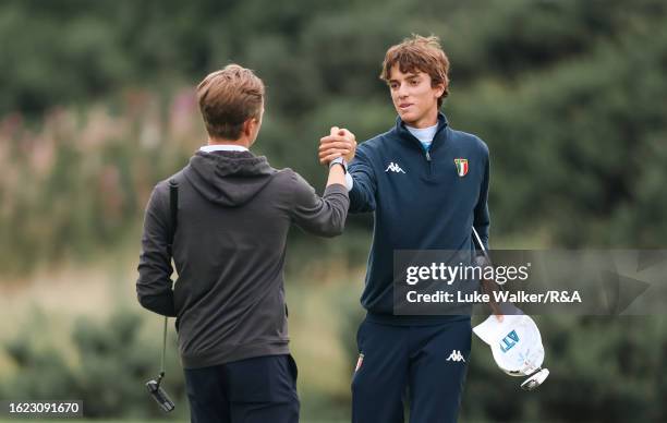 Michele Ferrero of Italy is congratulated by William Wistrand of Sweden on Day Four of the R&A Boys' Amateur Championship at Ganton & Fulford Golf...