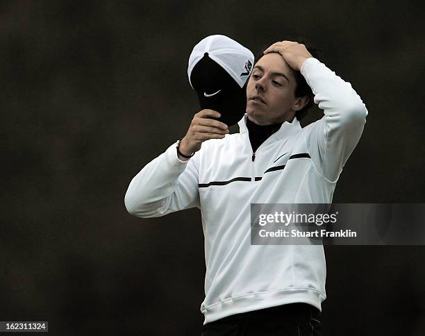 Rory McIlroy of Northern Ireland reacts after he lost his match to Shane Lowry of Ireland during the first round of the World Golf Championships -...