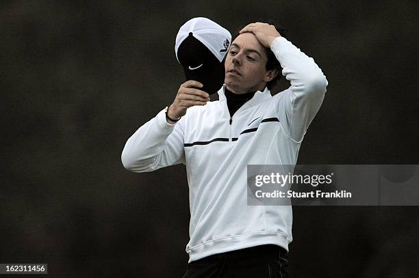 Rory McIlroy of Northern Ireland reacts after he lost his match to Shane Lowry of Ireland during the first round of the World Golf Championships -...