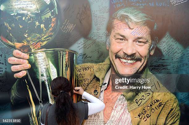 Fans sign the display of Dr. Jerry Buss after his memorail service outside the Nokia Theatre L.A. Live on February 21, 2013 in Los Angeles,...