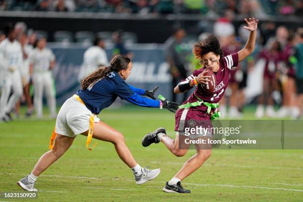 An athlete from the new PIAA girls flag football league performs during halftime at the Preseason game between the Indianapolis Colts and the...