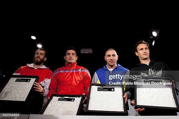 Real Madrid football and basketball players Sergio Rodriguez, Antonio Adan, Karim Benzema and Ricardo Carvalho attend Adidas Store Re-Opening at...