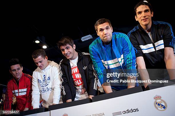 Real Madrid football and basketball players Jose Callejon, Nacho Fernandez, Alvaro Morata, Felipe Reyes and Carlos Suarez attend Adidas Store...