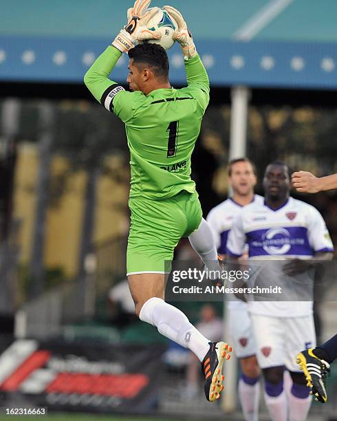 Goalie Miguel Gallardo of Orlando City grabs a shot against the Philadelphia Union February 9, 2013 in the first round of the Disney Pro Soccer...