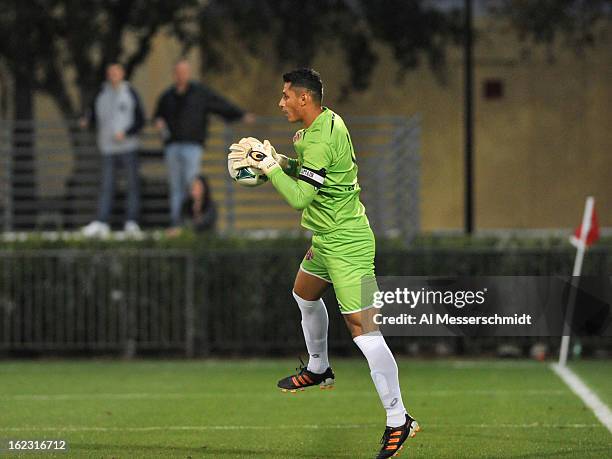 Goalie Miguel Gallardo of Orlando City dives blocks a shot against the Philadelphia Union February 9, 2013 in the first round of the Disney Pro...