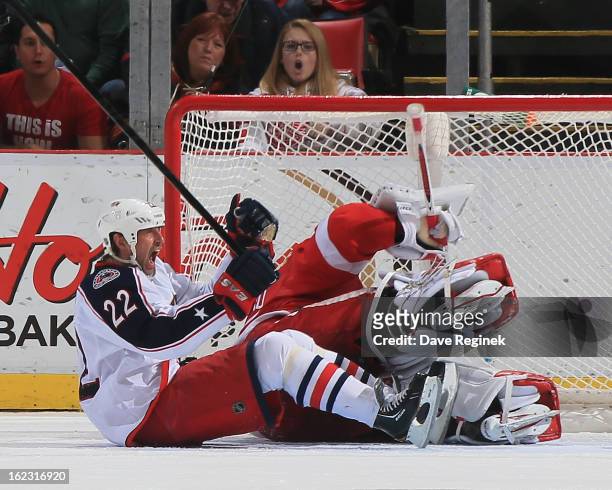 Vinny Prospal of the Columbus Blue Jackets celebrates scoring the game-winning goal with less than a minute left to play against Jimmy Howard of the...