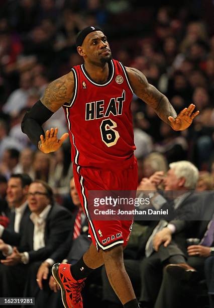 LeBron James of the Miami Heat reacts after hitting a shot against the Chicago Bulls at the United Center on February 21, 2013 in Chicago, Illinois....