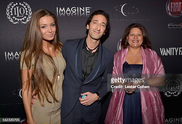 Lara Leito, actor Adrien Brody, and Director of Communication and Public Information of International Labour Organization Marcia Poole attend Vanity...