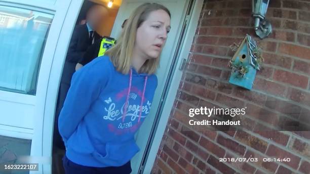 In this frame from a police body-camera video provided by Cheshire Constabulary, Lucy Letby is arrested on July 3, 2018 in Chester, England. Letby, a...