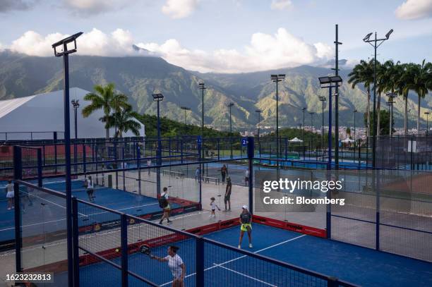 Members play padel tennis at a club in Caracas, Venezuela, on Thursday, Aug. 17, 2023. Nicolas Maduro is cracking down on the Venezuelan elite's...