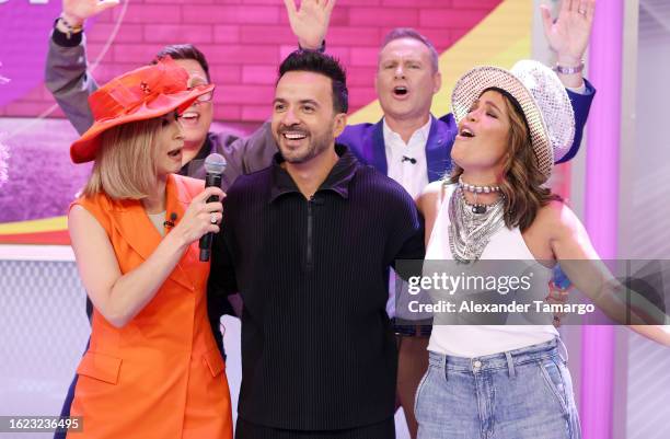 Elyangelica Gonzalez, Luis Fonsi and Karla Martinez are seen on the set of Despierta America at Univision Studios on August 25, 2023 in Doral,...
