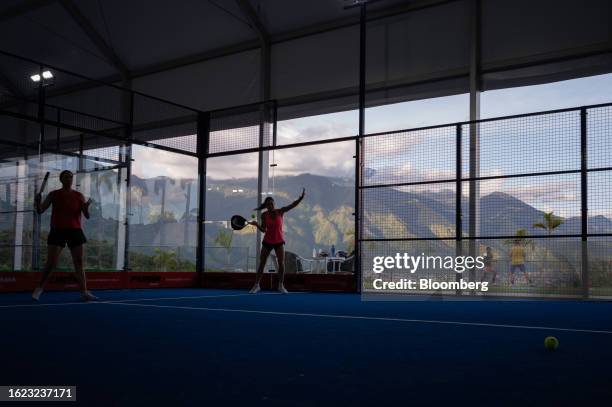 Members play padel tennis at a club in Caracas, Venezuela, on Thursday, Aug. 17, 2023. Nicolas Maduro is cracking down on the Venezuelan elite's...