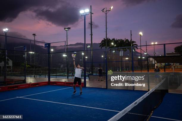 Members play padel tennis at a club in Caracas, Venezuela, on Thursday, Aug. 17, 2023. Nicolas Maduro is cracking down on the Venezuelan elite's...