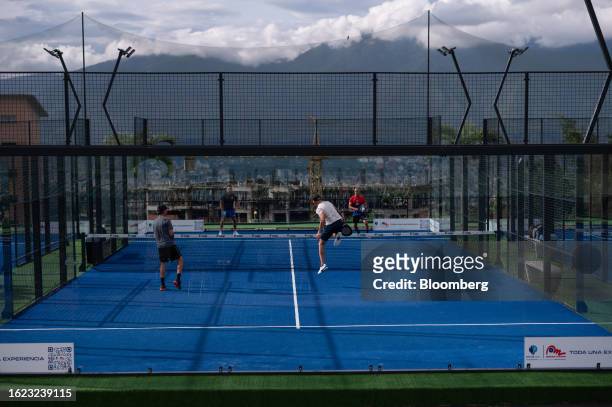 Members play padel tennis at a club in Caracas, Venezuela, on Monday, Aug. 21, 2023. Nicolas Maduro is cracking down on the Venezuelan elite's...