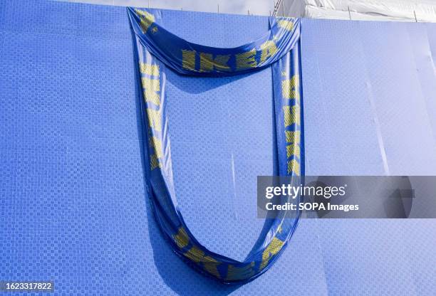 Giant Ikea blue shopping bag covers the construction site of the new Ikea store on Oxford Street, which is due to open in late 2024.