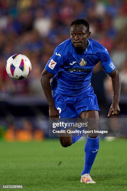 Djene Dakonam of Getafe CF runs with the ball during the LaLiga EA Sports match between Getafe CF and FC Barcelona at Coliseum Alfonso Perez on...