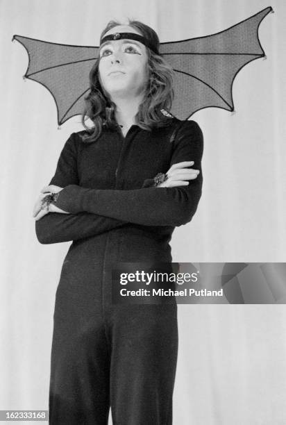 English singer-songwriter Peter Gabriel performing in costume with rock group Genesis, Newcastle City Hall, 1st October 1972.