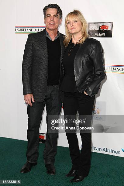 Actor Peter Gallagher and producer Paula Wildash arrives to the US-Ireland Alliance pre-Academy Awards gala at Bad Robot on February 21, 2013 in...