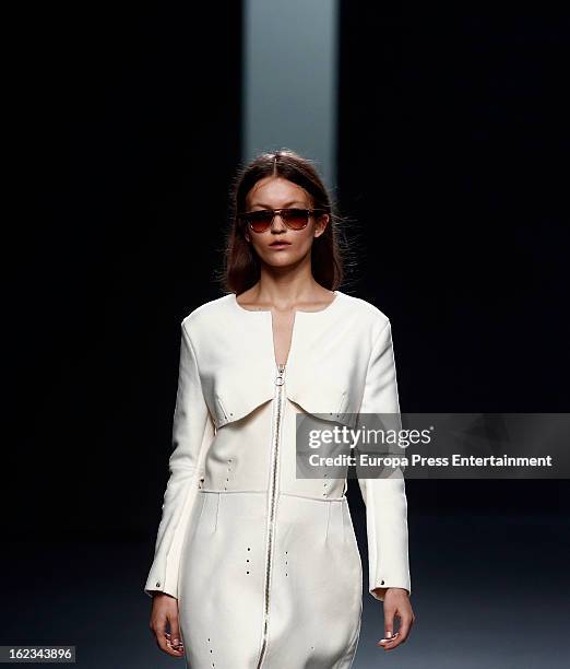 Model showcases designs by Martin Lamothe on the runway at the Martin Lamothe show during Mercedes Benz Fashion Week Madrid Fall/Winter 2013/14 at...