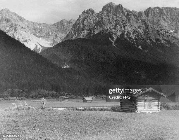 Barns in Mittenwald, under the Karwendel mountains in the Alps, circa 1950.