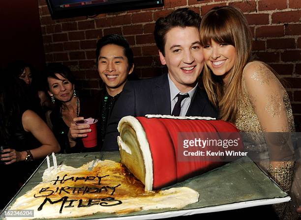 Actors Justin Chon, Miles Teller and Sarah Wright pose at the after party for the premiere of Relativity Media's "21 And Over" at the Westwood...