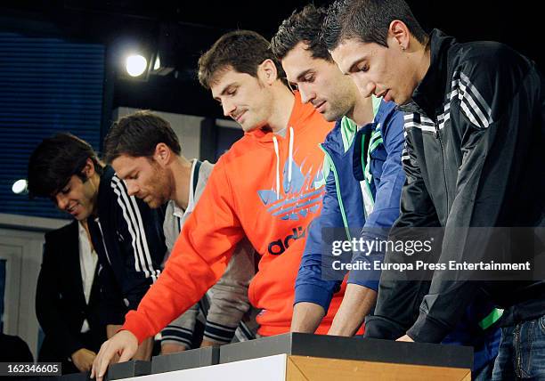 Real Madrid CF players Ricardo Kaka, Xabi Alonso, Iker Casillas, Alvaro Arbeloa and Angel Di Maria attend the opening of the new 'Adidas' store at...