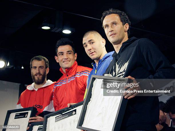 Players of Real Madrid CF and Ral Madrid Basketball Sergio Rodriguez, Antonio Adan, Karim Benzema and Ricardo Carvalho attend the opening of the new...