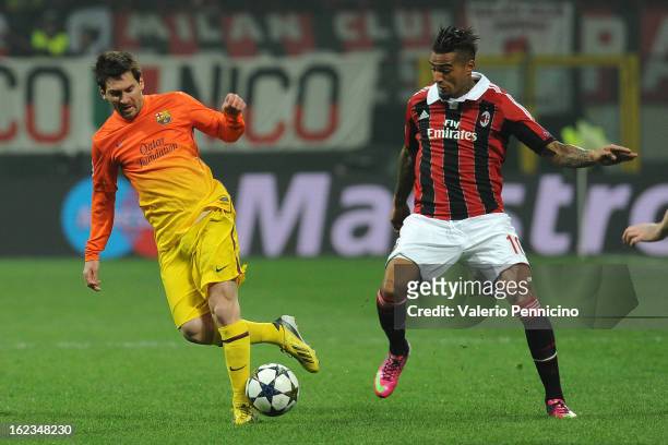 Lionel Messi of Barcelona in action against Kevin-Prince Boateng of AC Milan during the UEFA Champions League Round of 16 first leg match between AC...