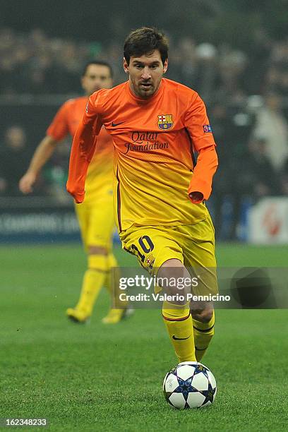 Lionel Messi of Barcelona in action during the UEFA Champions League Round of 16 first leg match between AC Milan and Barcelona at San Siro Stadium...
