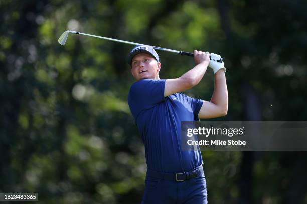 William Mouw hits his shot from the 11th tee during the second round of the Magnit Championship at Metedeconk National Golf Club on August 18, 2023...